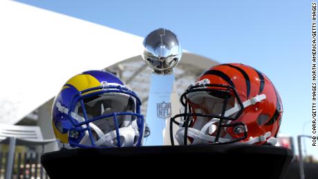 Inglewood, USA. 09th Feb, 2022. The helmets of Super Bowl participants Los  Angeles Rams (l) and Cinncinati Bengals stand on a table in front of the  Vince Lombardy Trophy, which the winner