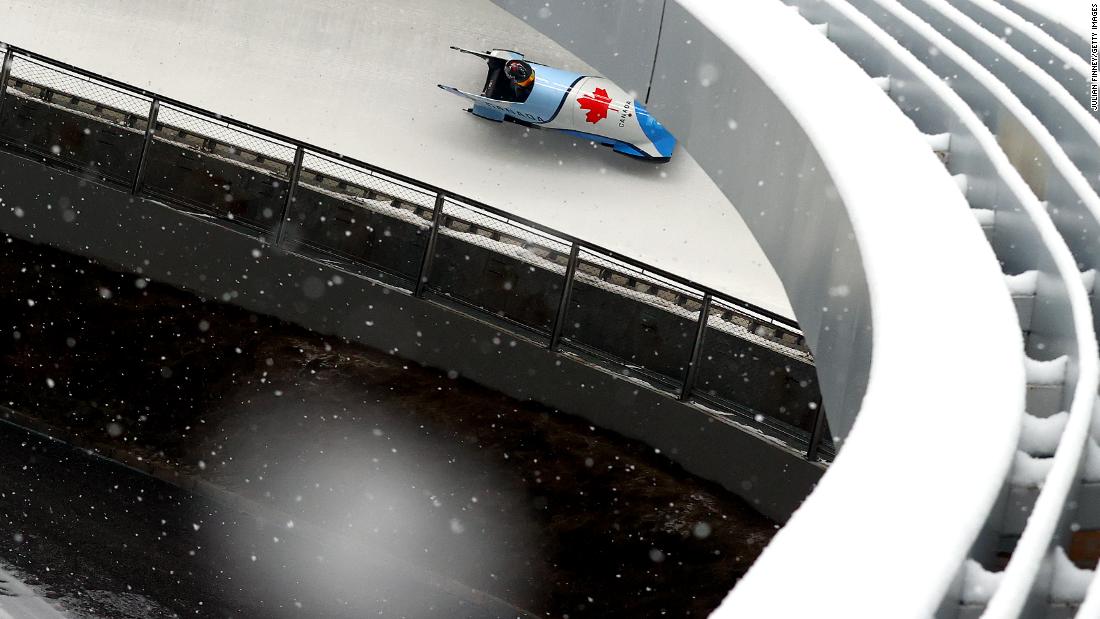 Snow falls as Canada&#39;s Cynthia Appiah competes in the monobob on February 13.