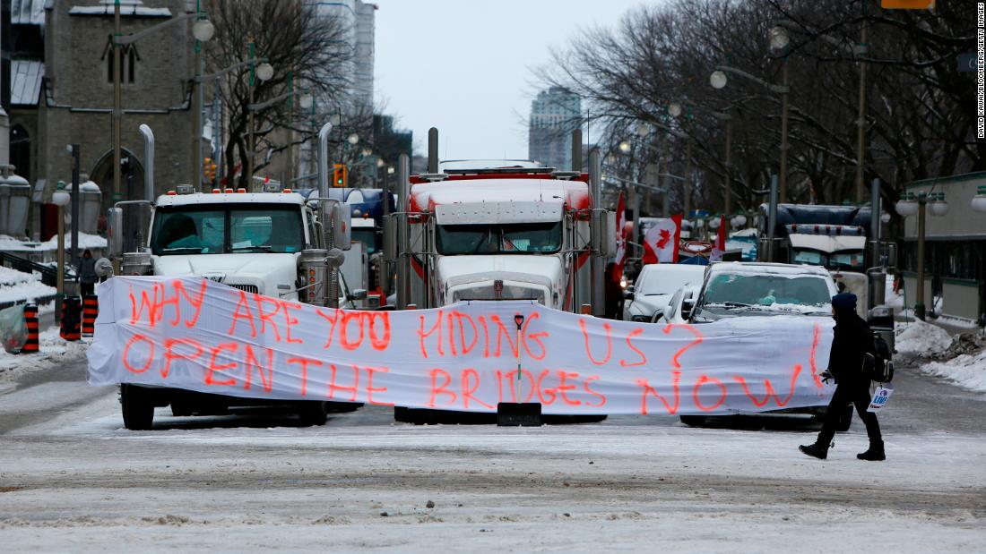 Trucks from the so-called Freedom Convoy block downtown streets during a demonstration in Ottawa on February 3.