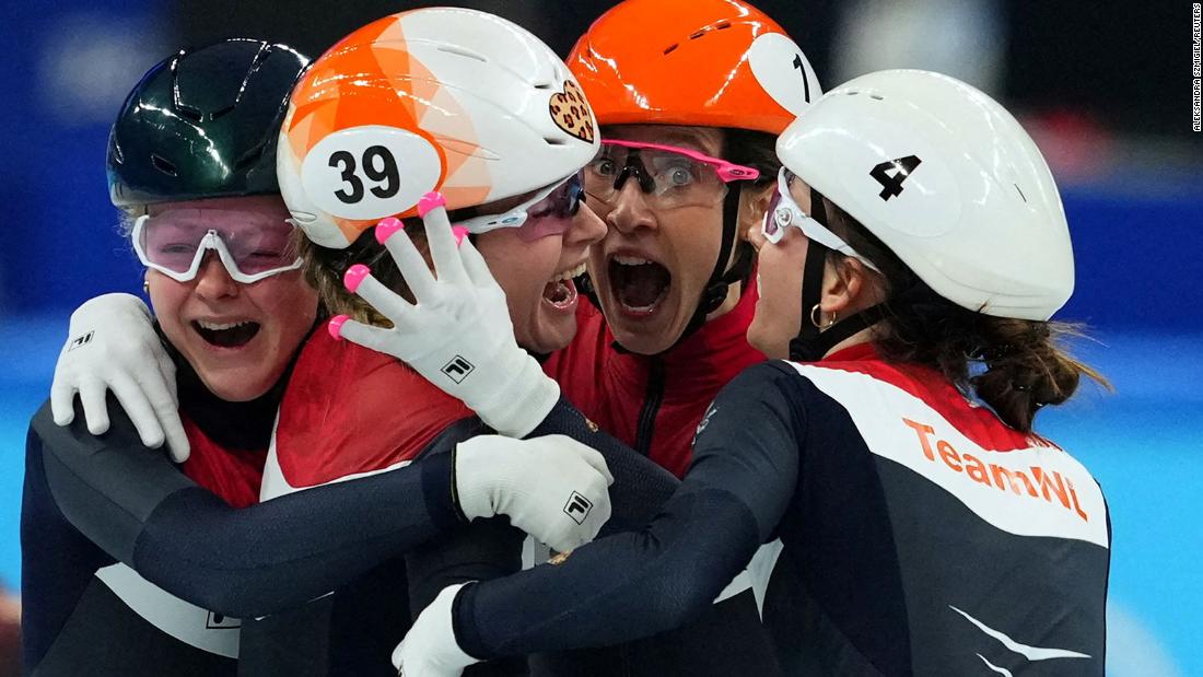 Dutch speedskaters Xandra Velzeboer, Suzanne Schulting, Selma Poutsma and Yara Van Kerkhof react after winning gold in the 3,000-meter short track relay on February 13. They also set an Olympic record in the race.