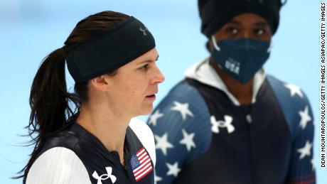Brittany Bowe (left) and Erin Jackson look on during a training session at Beijing&#39;s National Speed Skating Oval ahead of the Winter Olympics.