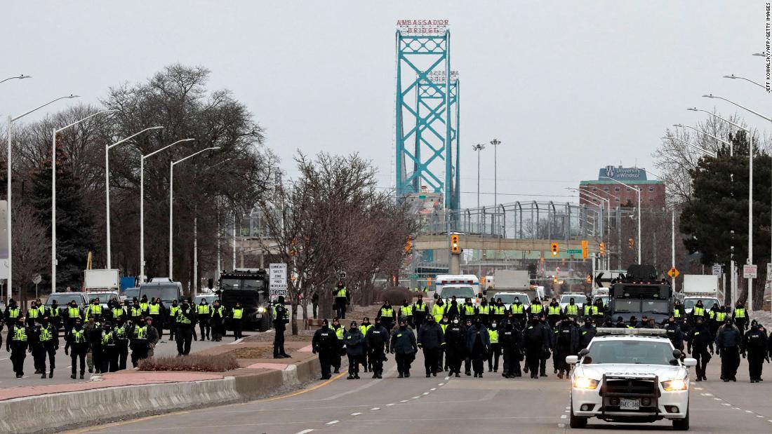 Canadian police seize long guns, high-capacity magazines, body armor and a machete after arresting protesters near border