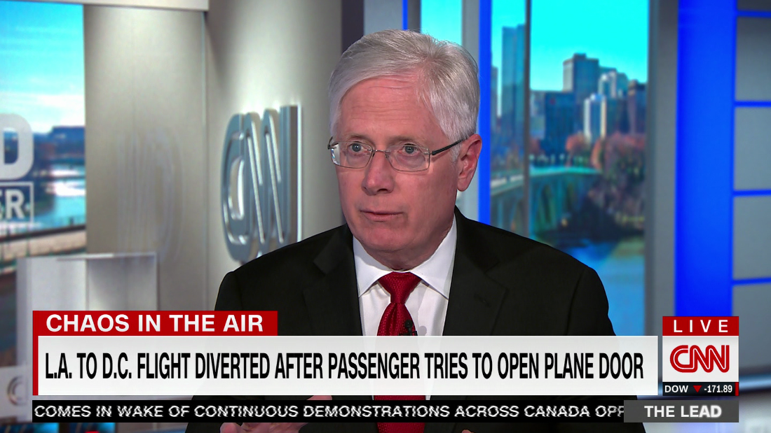 L.A. to DC flight diverted after passenger tries to open plane door – CNN Video