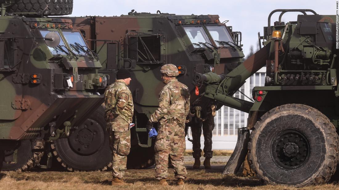 US soldiers and military vehicles are seen at a military airport in Mielec, Poland, on February 12. The White House approved a plan for the nearly 2,000 US troops in Poland &lt;a href=&quot;https://www.cnn.com/2022/02/09/politics/white-house-plan-troops-help-americans-leave-ukraine/index.html&quot; target=&quot;_blank&quot;&gt;to help Americans who may try to evacuate Ukraine&lt;/a&gt; if Russia invades, according to two US officials familiar with the matter.