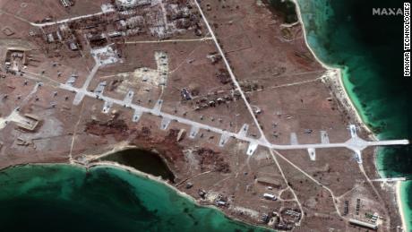 Satellite images taken on February 13 show at least 60 helicopters on the northern portion of the previously unused military base in Crimea.