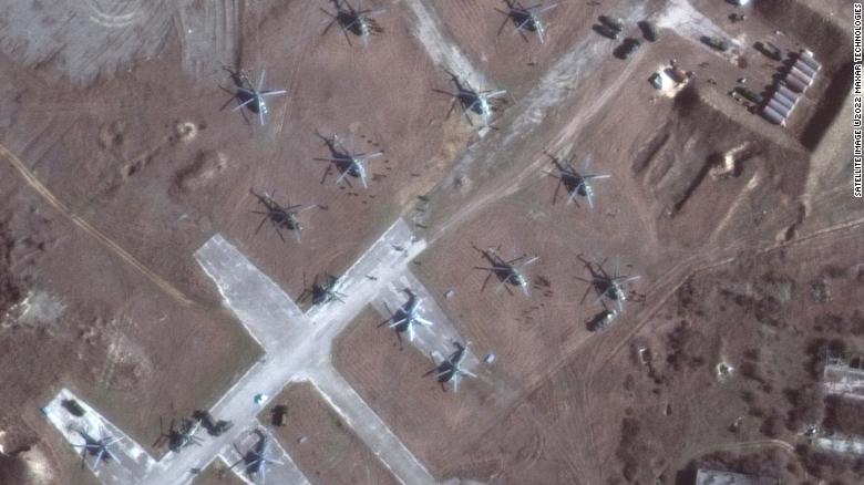 Satellite images taken on Sunday, February 13, by Maxar Technologies reveal that dozens of helicopters have appeared at a previously vacant airbase in Russian-occupied Crimea.