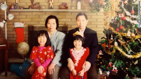 Selina Wang as a child, pictured with her family.