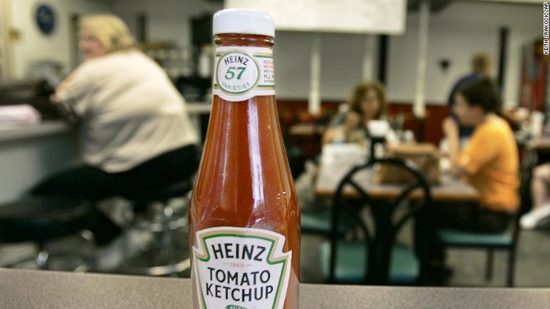 The orginal purpose of the label on the neck of the Heinz ketchup bottle was to draw more attention to the &quot;57 varieties&quot; slogan, according to the Heinz History Center.