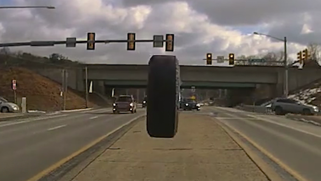 Watch: Runaway tire smash police cruiser windshield – CNN Video