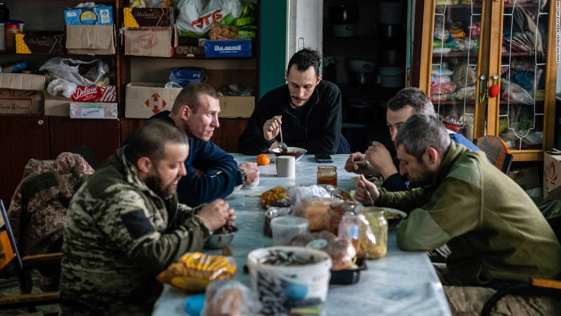 Fighters with the Right Sector, a paramilitary organization that has also become a political party, eat lunch at the group&#39;s headquarters in Novohrodivka, Ukraine. The Right Sector formed in 2013 during the Maidan revolution in Kyiv, and in 2014 and 2015 it fought many battles against Russian-supported separatists.