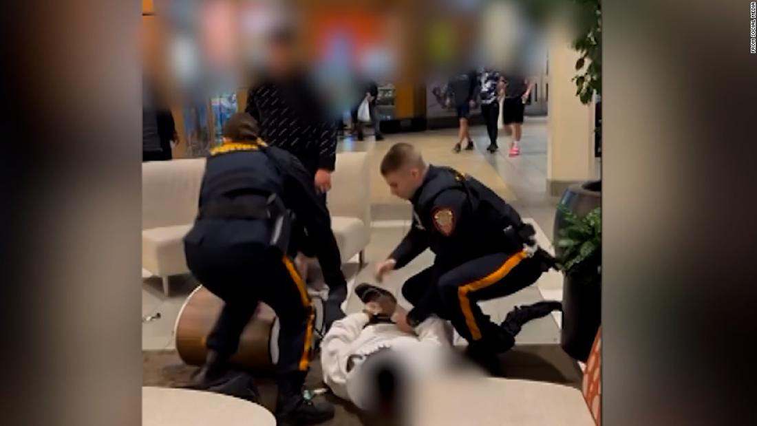 Video showing police breaking up a fight between a Black teen and a White teen in a New Jersey mall prompts outrage – CNN