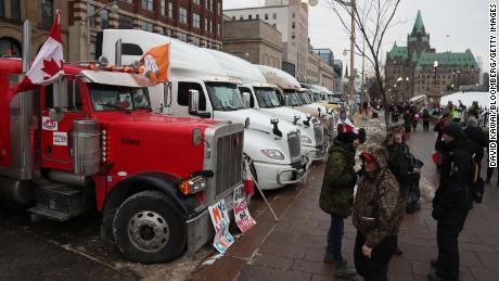 Trucks parked on Wellington Street, in front of Parliament Hill, during a demonstration in Ottawa, Ontario, Wednesday.