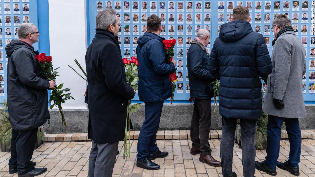 Ambassadors of European countries lay roses at the Wall of Remembrance in Kyiv on February 16. The wall contains the names and photographs of military members who have died since the conflict with Russian-backed separatists began in 2014.