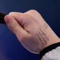olympics curler notes hand