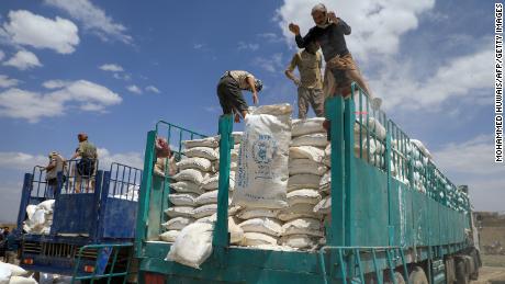 Yemen&#39;s Houthi rebels dispose of expired aid packages from the World Food Programme (WFP) in the capital Sanaa in 2019.