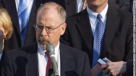 U.S. Attorney John Durham, center, outside federal court in New Haven, Connecticut in February 2021