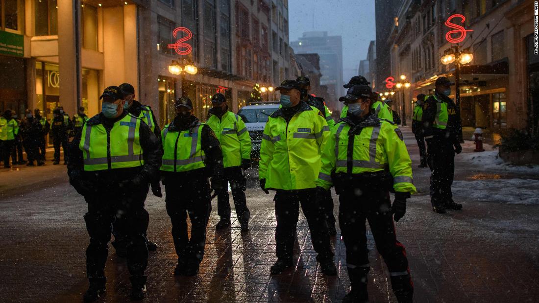 Police in Ottawa build more fencing around the city as they prepare to bring the Covid-19 protests to an end