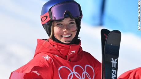 China's Eileen Gu created Winter Olympic history by winning her third freeski medal on Friday.