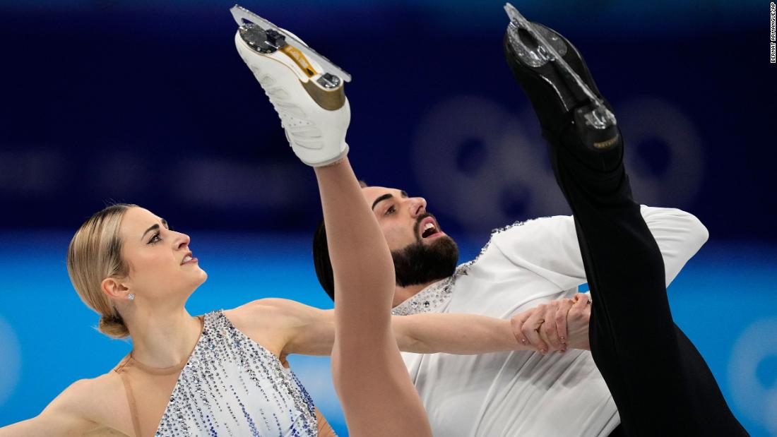 American figure skating duo Ashley Cain-Gribble and Timothy LeDuc skate in the pairs short program on Friday, February 18. LeDuc became &lt;a href=&quot;https://www.cnn.com/world/live-news/beijing-winter-olympics-02-18-22-spt/h_7b9d80df24c32f6fa873b04cf4cc6897&quot; target=&quot;_blank&quot;&gt;the first openly nonbinary athlete to compete at a Winter Olympics.&lt;/a&gt;
