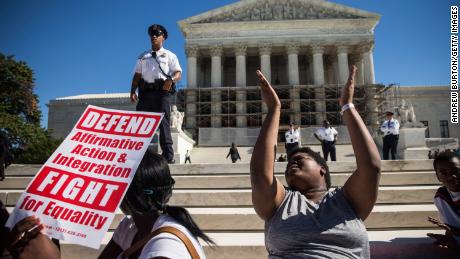 Students protest in support of affirmative action outside the Supreme Court on October 15, 2013, in Washington. 