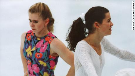 US figure skaters Tonya Harding and Nancy Kerrigan take a break during training in 1994.
