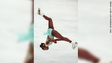 Surya Bonaly performs a backflip in her free skate routine.