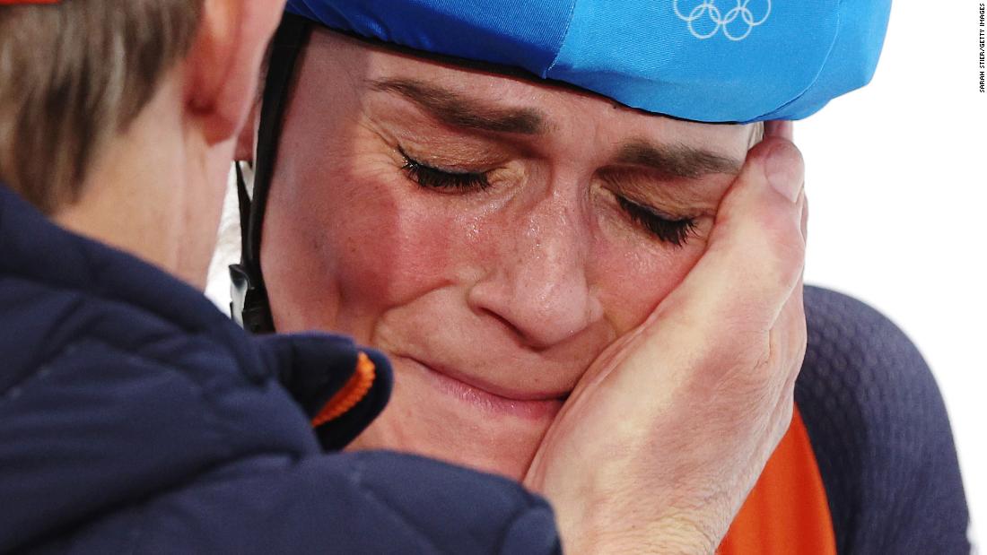 Dutch speedskater Irene Schouten celebrates with a teammate after winning gold in the mass start final on February 19. It was her third gold medal of this year&#39;s Olympics.