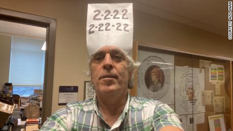 Aziz Inan wore a homemade paper bag hat on February 2, 2022, and plans on wearing a similar hat on February 22. 