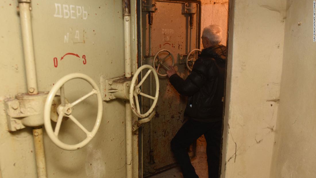 An employee inspects a bomb shelter in Lviv, Ukraine, on February 21.