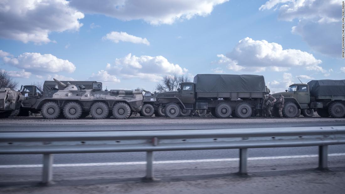 Russian trucks and armored vehicles park along a highway roughly 60 miles north of the Ukraine border near Rostov-on-Don, Russia, on February 21.