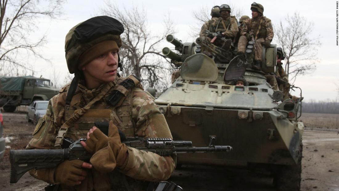 Ukrainian servicemen patrol in the Luhansk region of Ukraine on February 24.