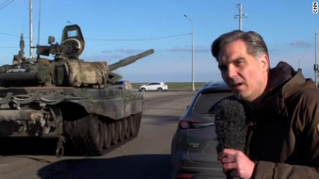 Russian tanks roll past CNN reporter as they appear to head toward Ukraine (February 2022)