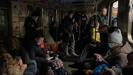 People take shelter in a metro station in Kharkiv.