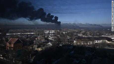 Black smoke rises from a military airport in Chuguyev near Kharkiv  on Thursday.