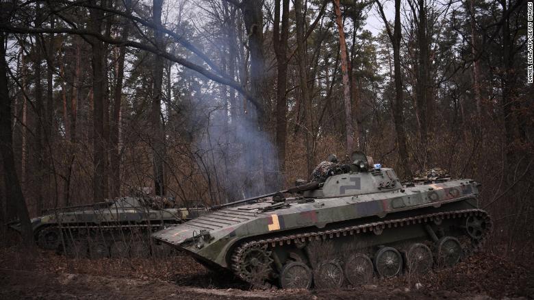 A photograph taken on February 24, 2022 shows an Ukrainian infantry combat vehicle standing guard on the outskirts of Kyiv.