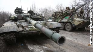 Kyiv hit with 'cruise or ballistic missiles' as Russia attempts to encircle  Ukrainian capital
