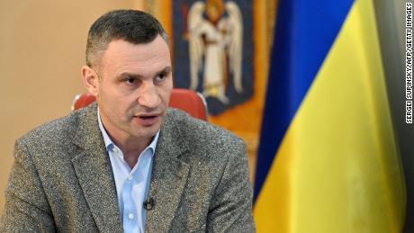 Kyiv mayor Vitali Klitschko, pictured here in his office on February 10, said he would fight for his country.