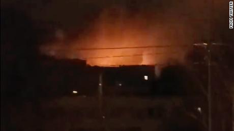 A frame taken from a video shared on Twitter shows explosions purportedly taken near the Kyiv Zoon.