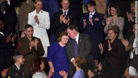 Parents of deceased Marine Sgt. Byron Norwood, Janet and William Norwood, stand after being mentioned by President George W. Bush during the State of the Union address in 2005.