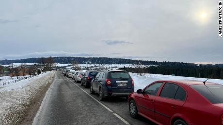 Ukrainians waiting in a queue of cars to cross the border into Poland, February 26, 2022.