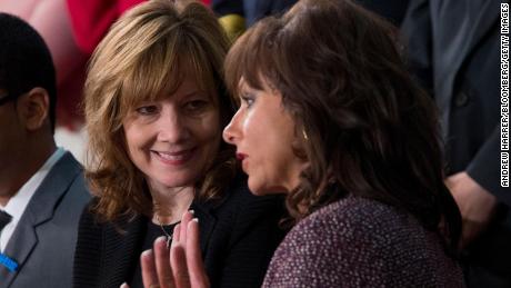 Mary Barra, chief executive officer of General Motors Co. center, speaks to Andra Rush, president, founder and chief executive officer of Rush Trucking Inc., before U.S. President Barack Obama, not pictured, delivers the State of the Union address to a joint session of Congress on January 28, 2014.
