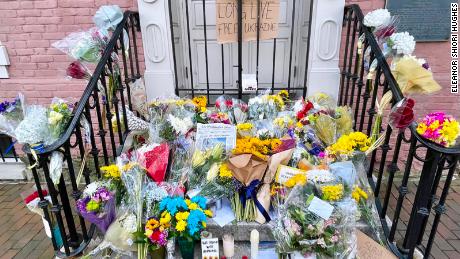 Flowers are seen left on the steps of the Ukraine Embassy in Washington on February 26.