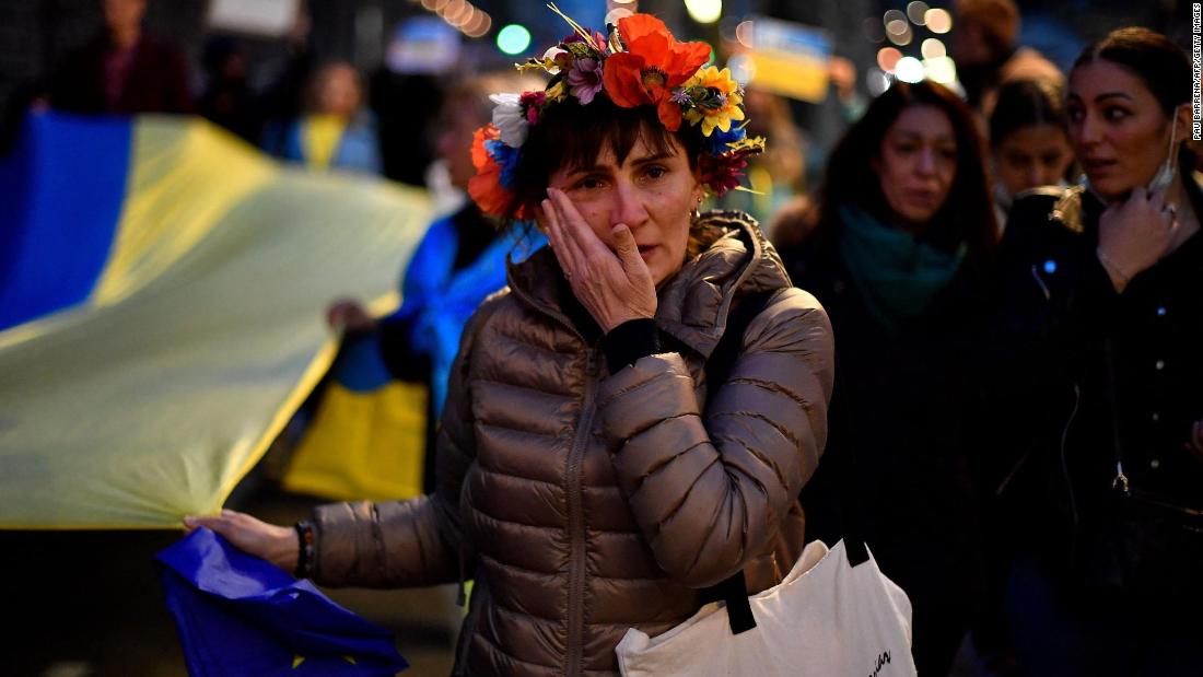 A demonstrator in Barcelona, Spain, cries February 24 during a protest against Russia&#39;s invasion of Ukraine.