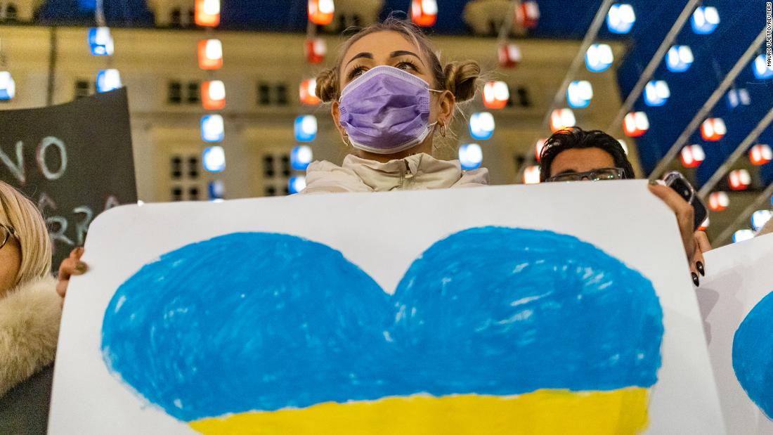 People gather in Turin, Italy, to show their support for Ukraine on February 25.