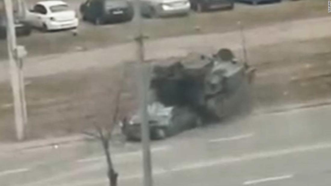 Bystanders help remove driver after colliding with military vehicle – CNN Video