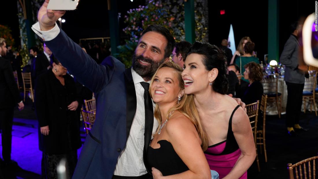 Néstor Carbonell takes a selfie with &quot;The Morning Show&quot; co-stars Reese Witherspoon, center, and Julianna Margulies.