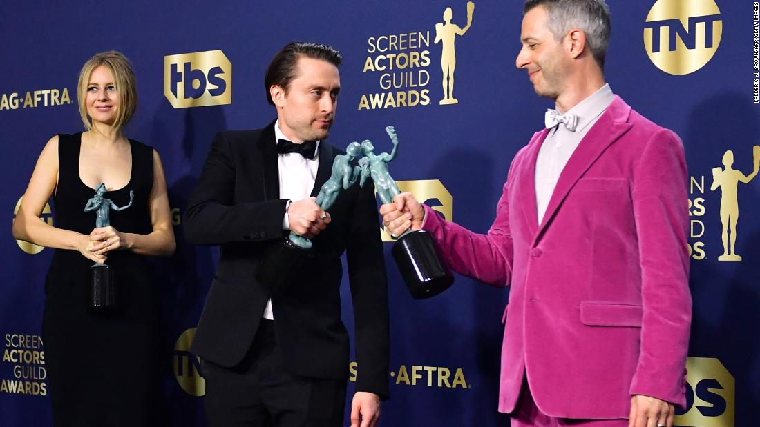 &quot;Succession&quot; actors Kieran Culkin, center, and Jeremy Strong bump awards after the show&#39;s cast won outstanding performance by an ensemble in a drama series.