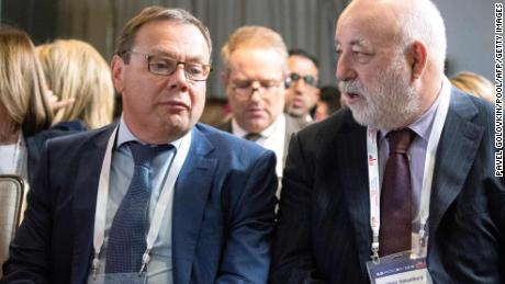 Russian businessman Mikhail Fridman, left, and businessman Viktor Vekselberg talk during a conference in Moscow on September 17, 2019. 