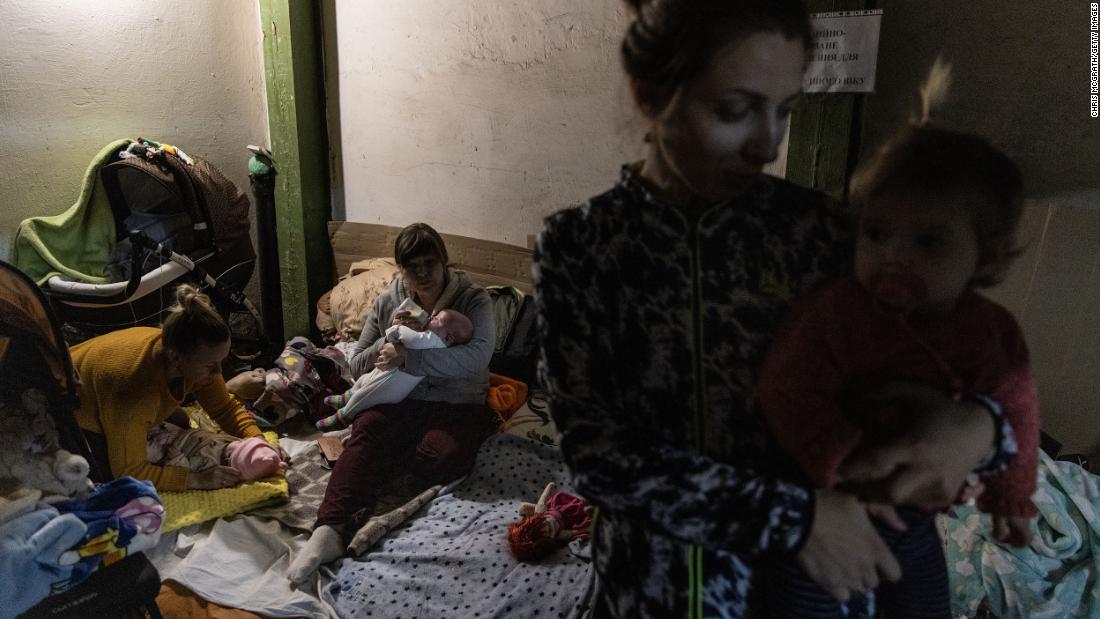 Mothers tend to their babies in the bomb shelter of a children&#39;s hospital in Kyiv on February 28.