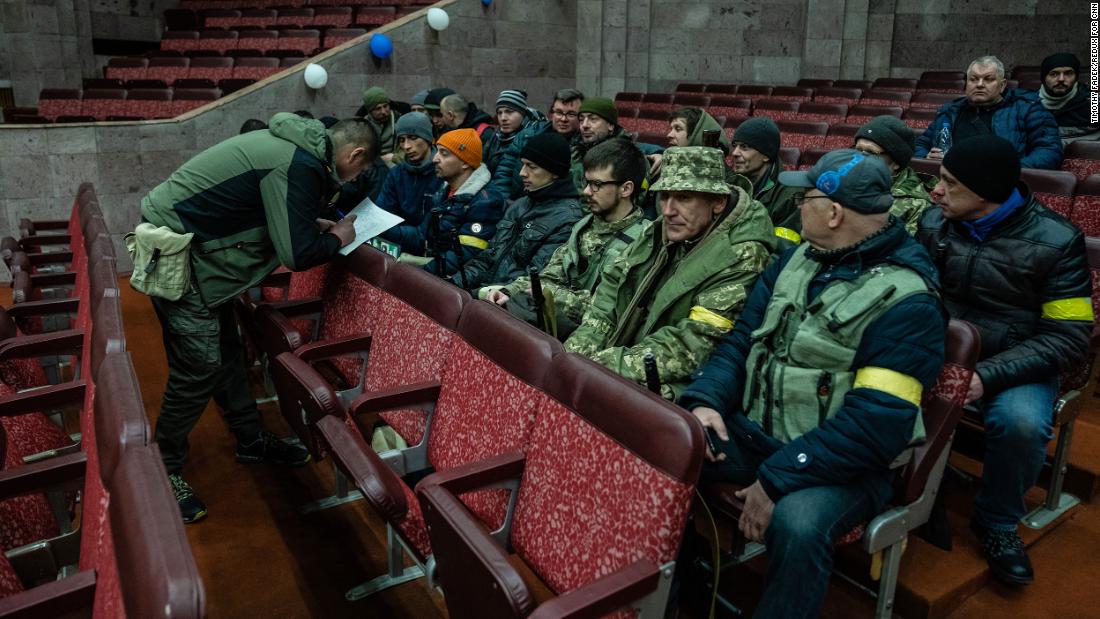 Volunteers in Kyiv sign up to join Ukraine&#39;s Territorial Defense Forces on February 28.